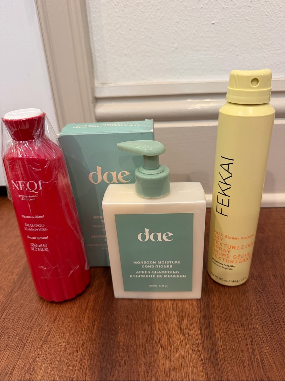 Neqi shampoo, dae conditioner, and Fekkai texturing